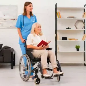 a nurse are caring a old lady who is sitted on a wheel chair this is a common job role for home nurse